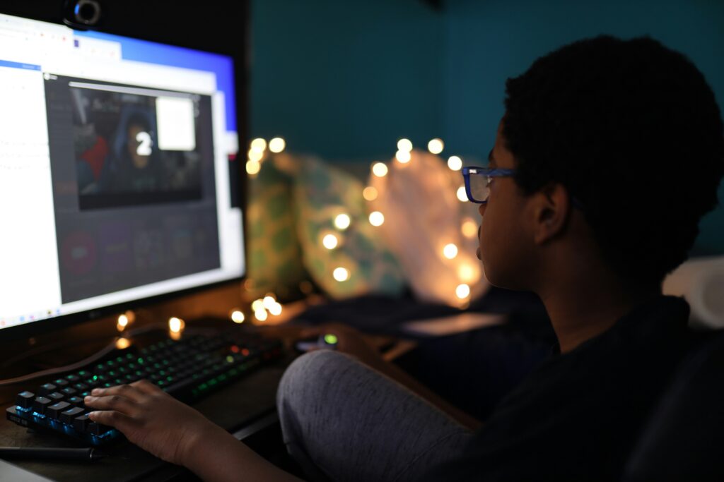 Student working at a desktop computer.