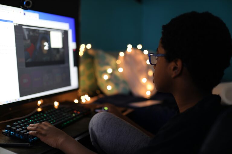 Student working at a desktop computer.